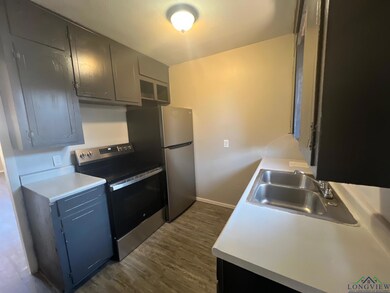 Kitchen with appliances with stainless steel finis