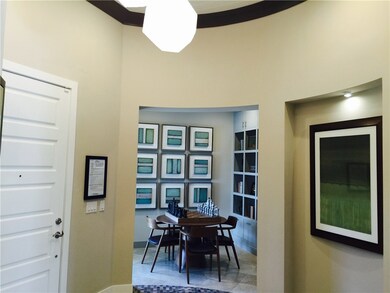 Photos are of the Gilmore model home entry foyer a