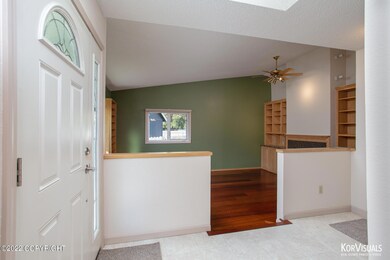 Entryway and sunken living room