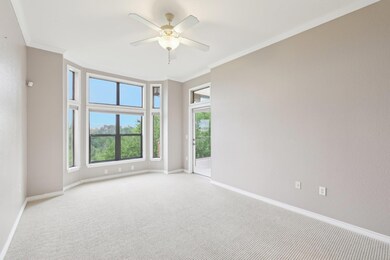 Unfurnished room with a ceiling fan, baseboards, 