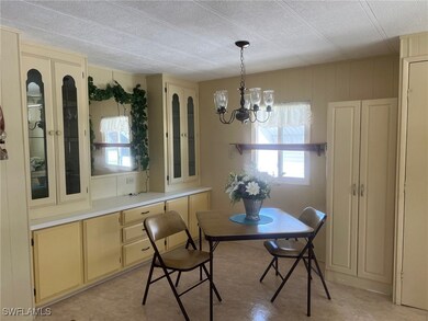 Dining space with a chandelier, healthy amount of