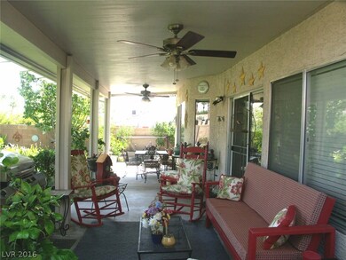 Sizeable covered patio with ceiling fans