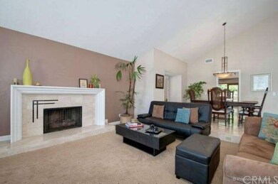 Formal living room with gas fireplace
