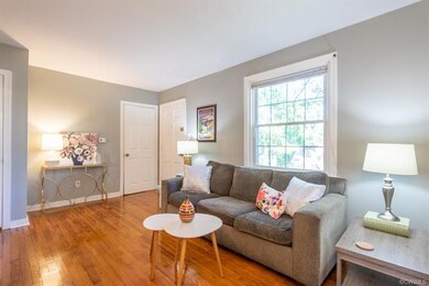 Cheerful & bright Living Room with beautiful hardwood floors