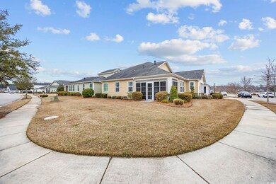 View of front facade with a front yard and a resid