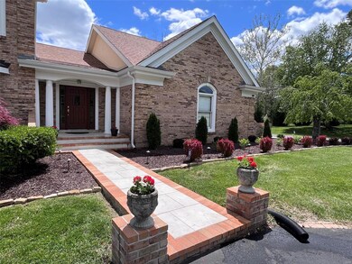 A secondary entrance leading to the massive laundry room and beautiful kitchen.