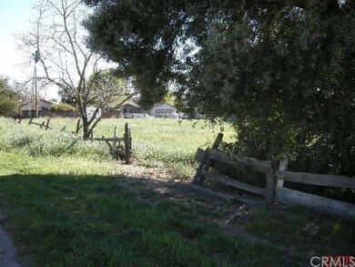 The remainder of the lot is vacant and goes right 