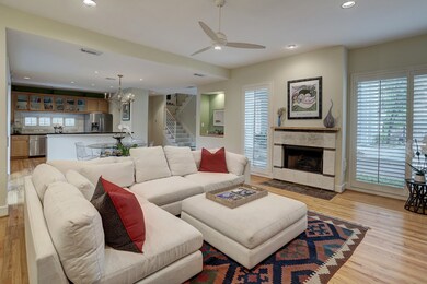 The oversized living/dining and kitchen area is fi