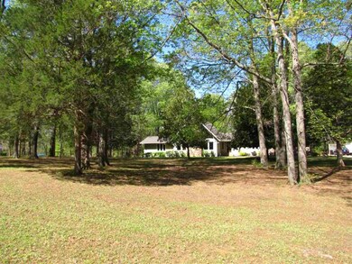 This home is situated on 3 beautiful acres in the 