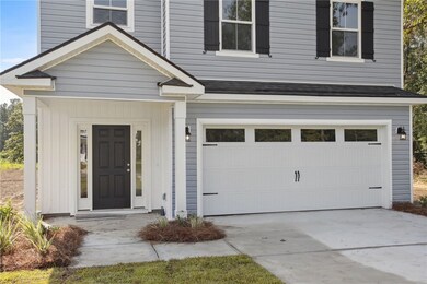 Be greeted by a covered front porch.