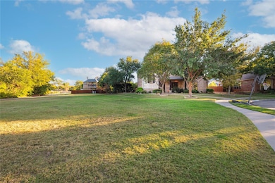 Huge adjacent green space next to house that is ma