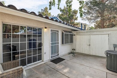 View of patio featuring cooling unit