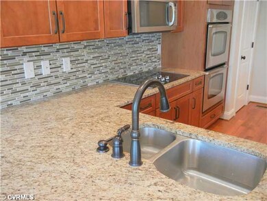 Kitchen - Exquisite touches like granite counters,
