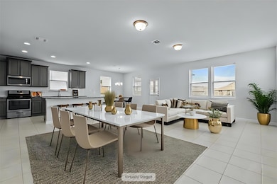 Dining area featuring light tile patterned floori