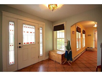 Entry. Front entry opens to coat...