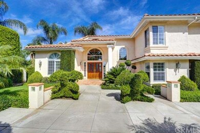 Front entrance to residence with garden 