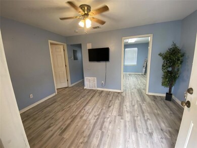 Entry into unit, Living Room. (*prior to painting)