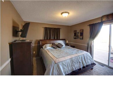 Master Bedroom with access to Deck, Walk In Closet