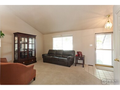 Formal living room with soaring vaults!