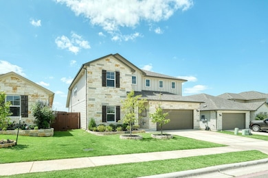 View of front of house featuring stone siding, bo