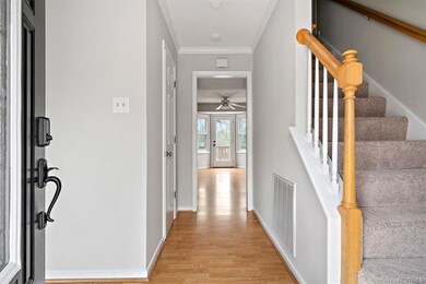 Front entry with view of the Eat-in Kitchen and yo