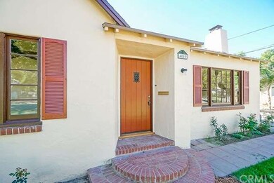 Charming front entrance with original wood front d