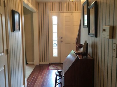 Beautiful entranceway with lovely hardwood floors 