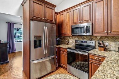 Kitchen featuring appliances with stainless steel 