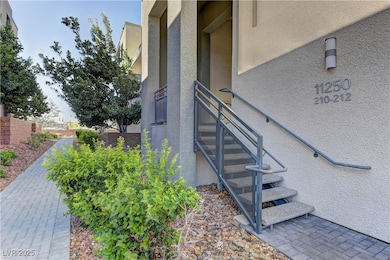 Property entrance featuring stucco siding