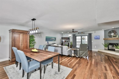 Beautiful hardwood floors in this open concept. With wood burning fireplace