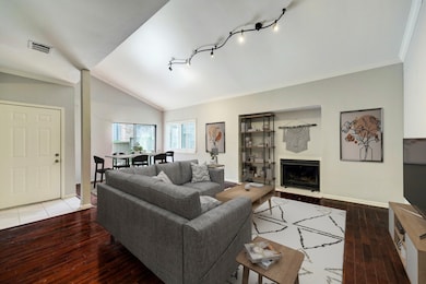 Virutally staged. Alternate view of the living and dining areas.