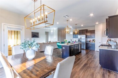 Open floor plan with custom moulding and lighting!