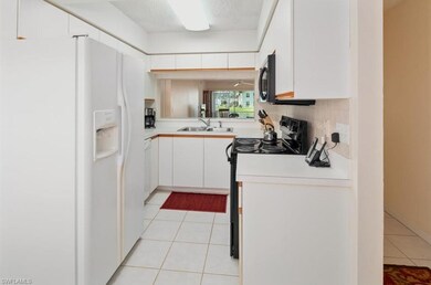 169 Grand Oaks Way unit 103, Naples, FL 34110 - photo 6