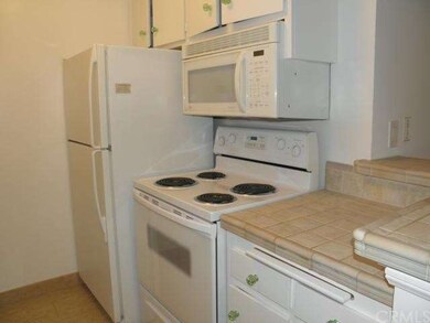 Kitchen appliances are included.