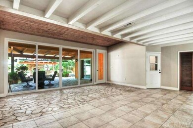 One of a kind open living room with large sliders 