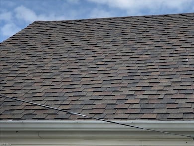 8503 Deerfield Dr, Parma, OH 44129-4338 - The dimensional shingle roof.