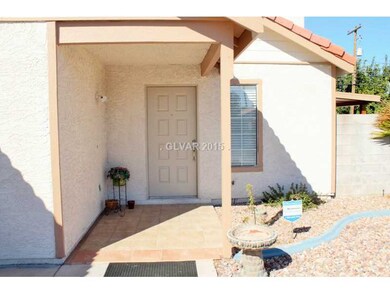 Facade/Exterior Front. Covered porch.