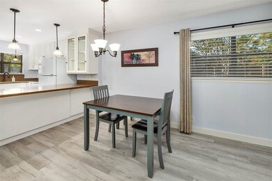 Kitchen Open to Dining and Living Area