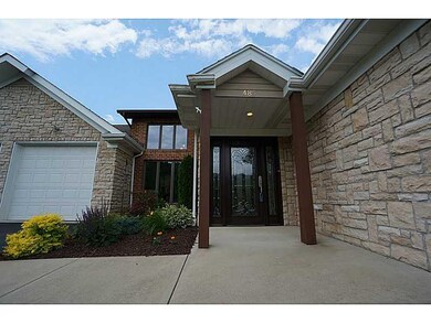 Exterior Front. A gorgeous cut/beveled glass door 