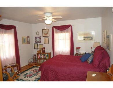 Bedroom. This home features a laundry shoot and 2 