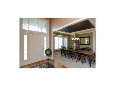 2-story entry is flooded with natural light.