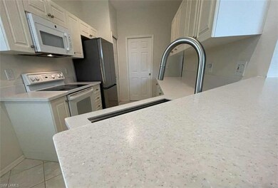 4690 Hawks Nest Way unit E204, Naples, FL 34114 - photo 7