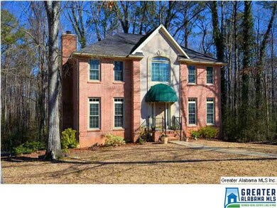 FULL BRICK ON 1.3 ACRES OF PRIVACY.