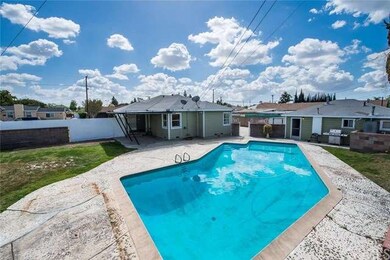 An absolutely incredible back yard with pool and g