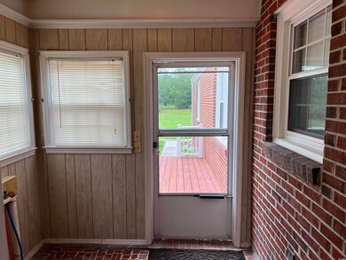 Entryway with wood walls