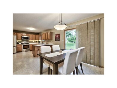 Eat-in Kitchen. FORMAL DINING AREA WITH SLIDER TO 