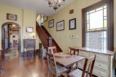 Front foyer with stained glass window on the right