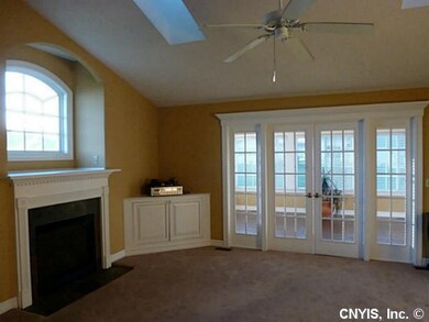 Great Room. Gas fireplace and built-in, cable read