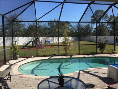 8266 Silver Birch Way, Lehigh Acres, FL 33971 - photo 2
