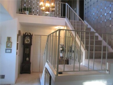 TWO STORY FOYER LEADING TO 2 BD, & FULL BATH UP